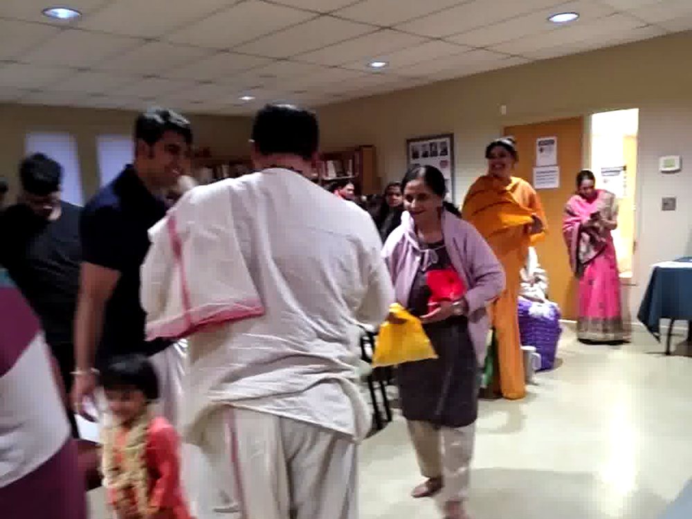 Devotees gathered for the Bhāgavata-kathā
