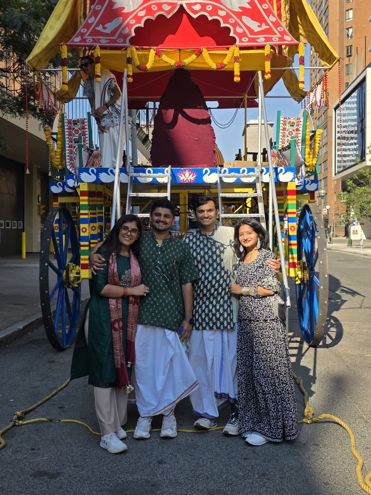 Sudbury Bhakti Centre devotees pulling Lord Jagannātha's chariot rope through downtown Toronto