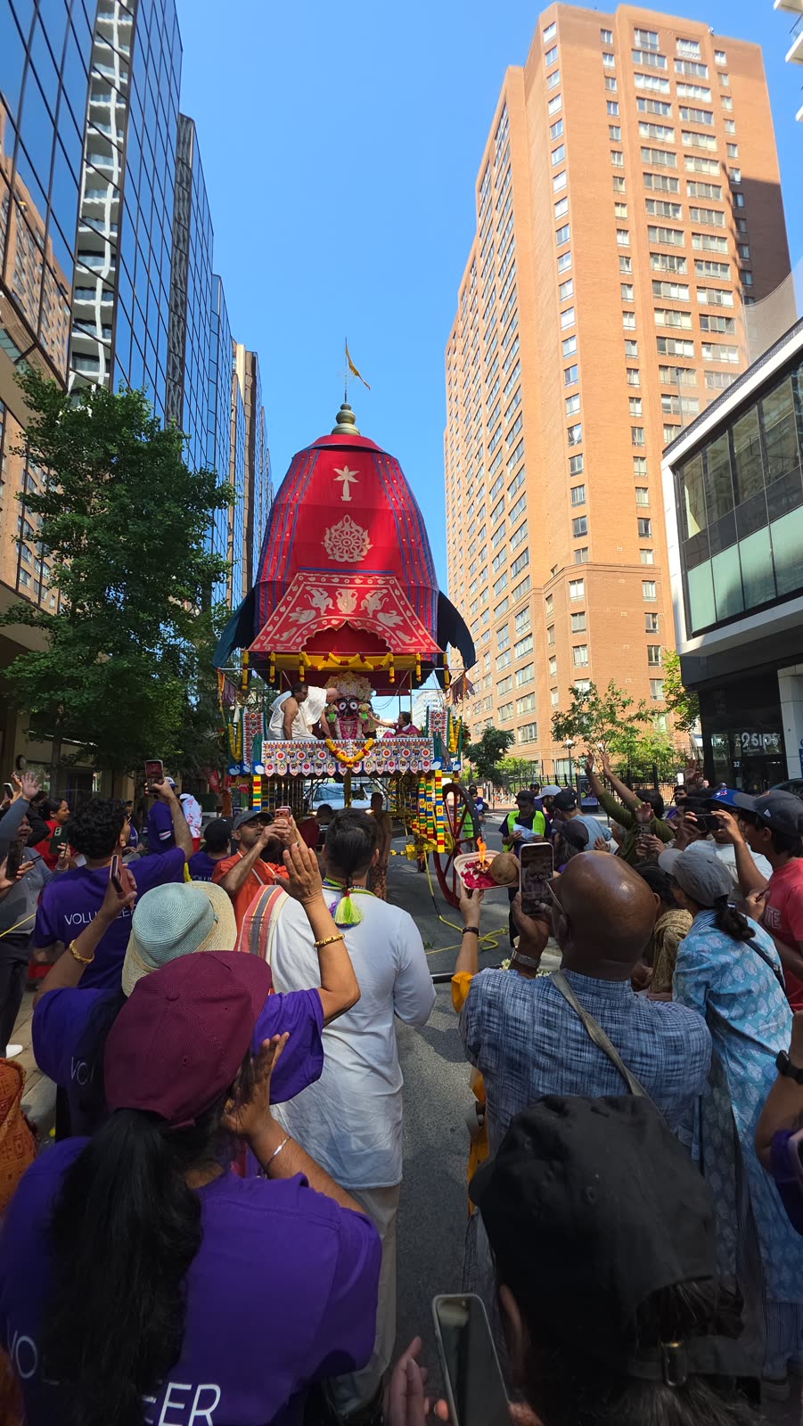Devotees holding the chariot's pulling rope during the procession