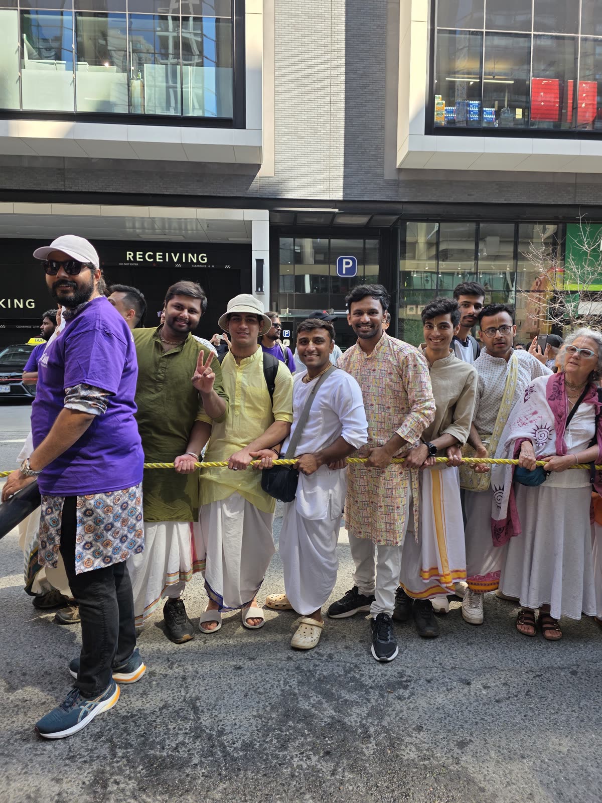 Devotees pulling Lord Jagannātha's chariot along the Toronto avenue